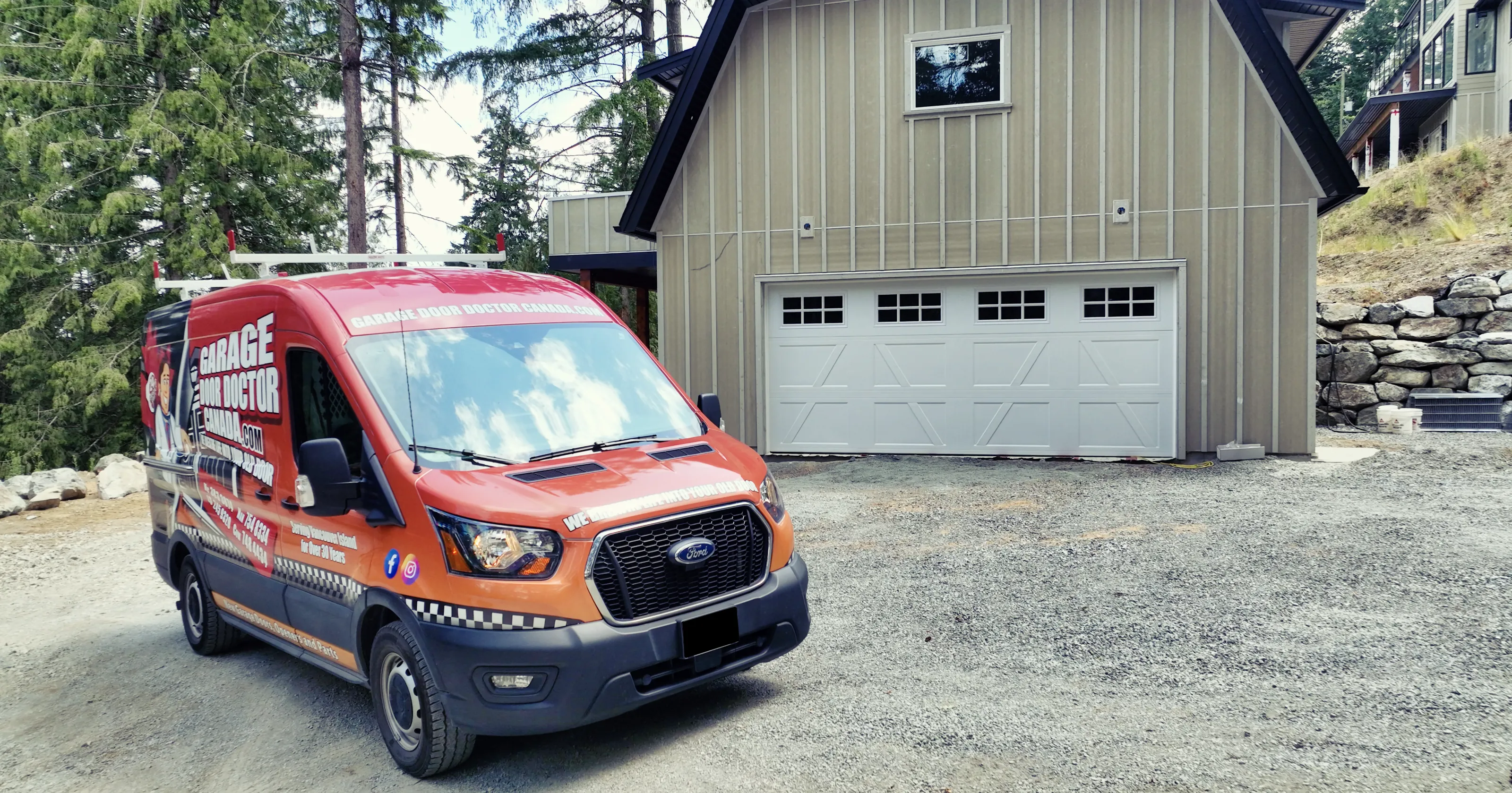 Garage Door Doctor Canada van at a new carriage-style garage door installation